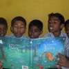 Student's reading their new library books