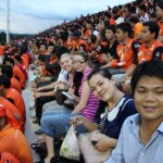 Katie and Stacey at a football match with teachers