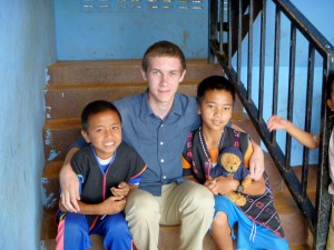 Andrew with students at his school in 2012