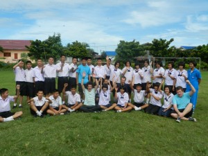 James, Richie and Josh with students at one of the schools they volunteered in June 2012