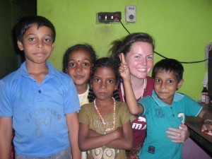 Lucy Allcock with host family children in 2012