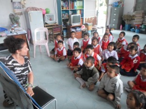 Emma teaching students  at her school