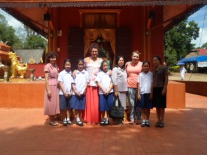 Emma & Becca with members of the host community