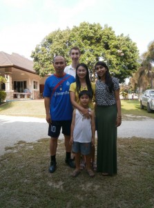 Chandni with her host family and volunteer partner