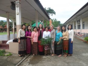 Katie with fellow volunteers Chloe & Ellie, with school teachers in traditional dress