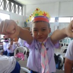 Student with the crown he made in Katie's class