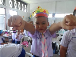 Student with the crown he made in Katie's class